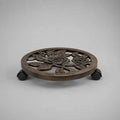 Runder Pflanzenroller aus Gusseisen, Bronze/Schwarz, Ø 30 × H 7 cm, mit 4 Rollen